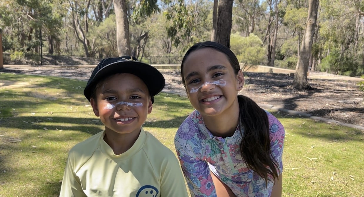 two kids smiling