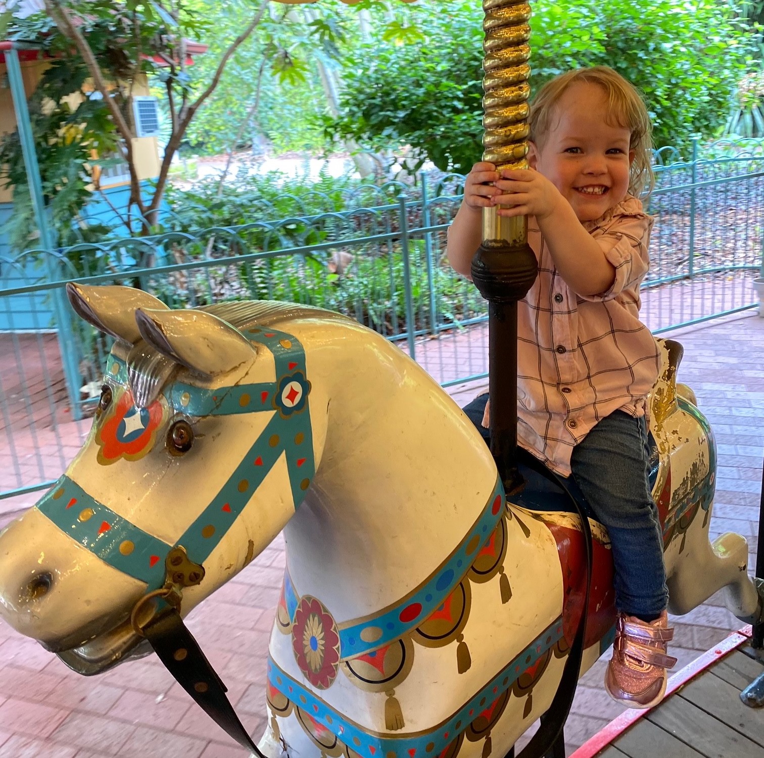 Isabella on a carousel